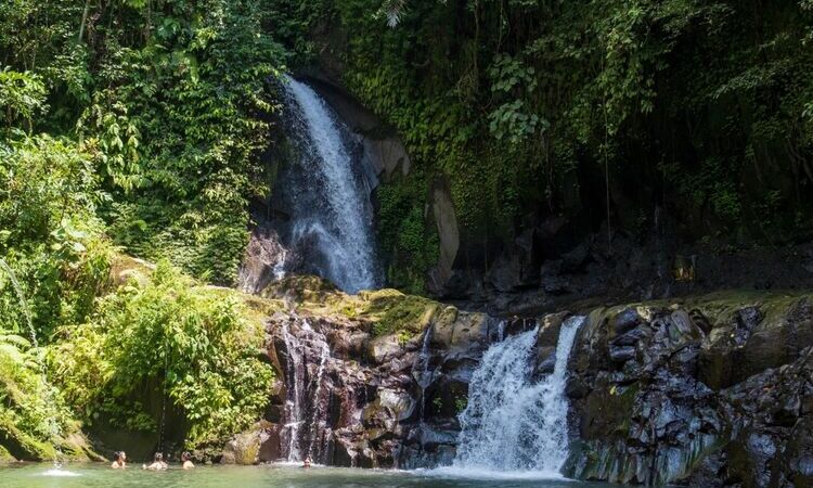 Bathe in Taman Sari waterfall and natural pool